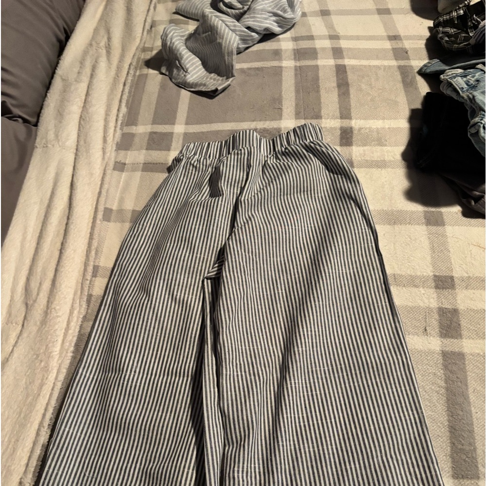 Blue and white striped pants. Worn once. No stains.
Smoke and bug free